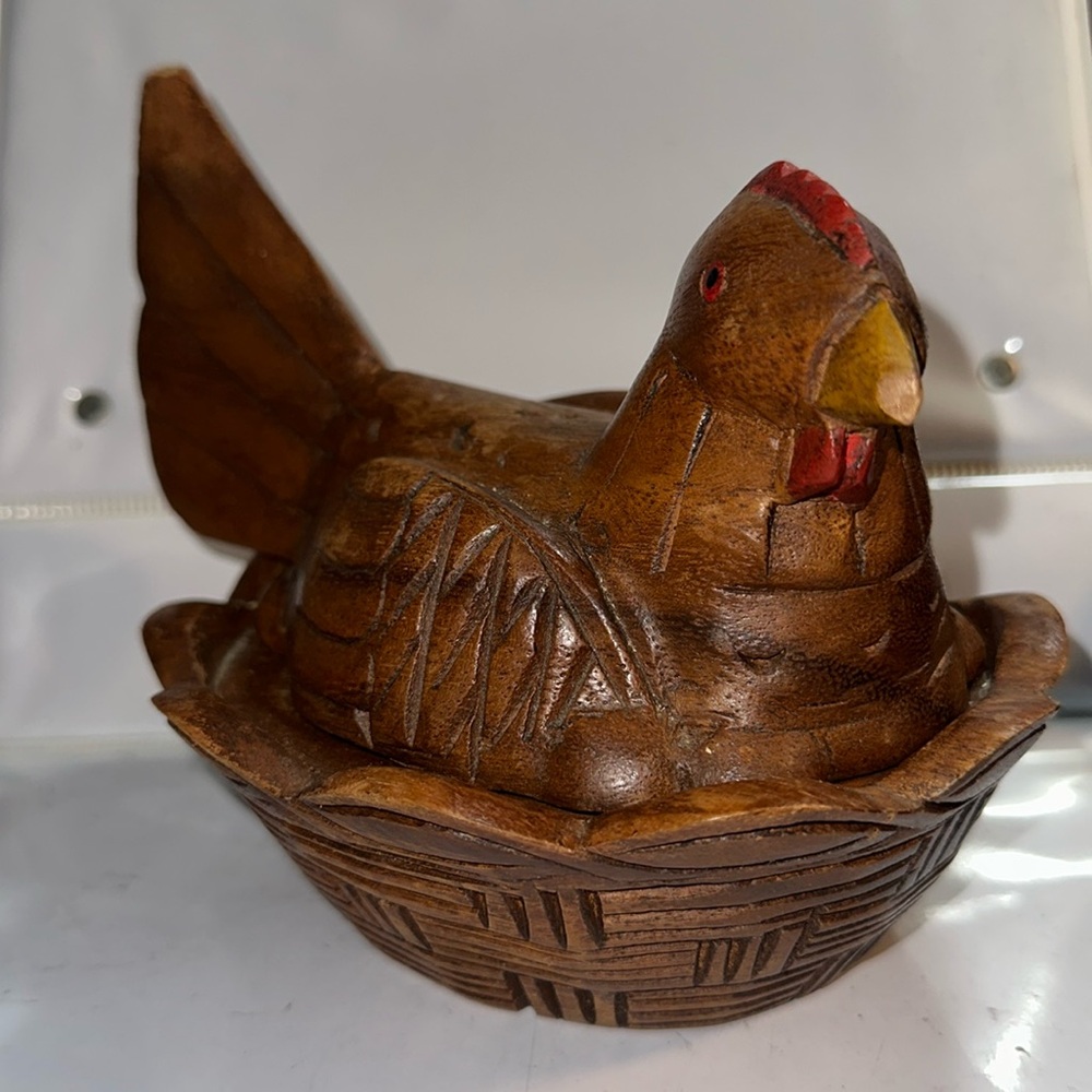 2 piece wooden hand carved hen on a nest